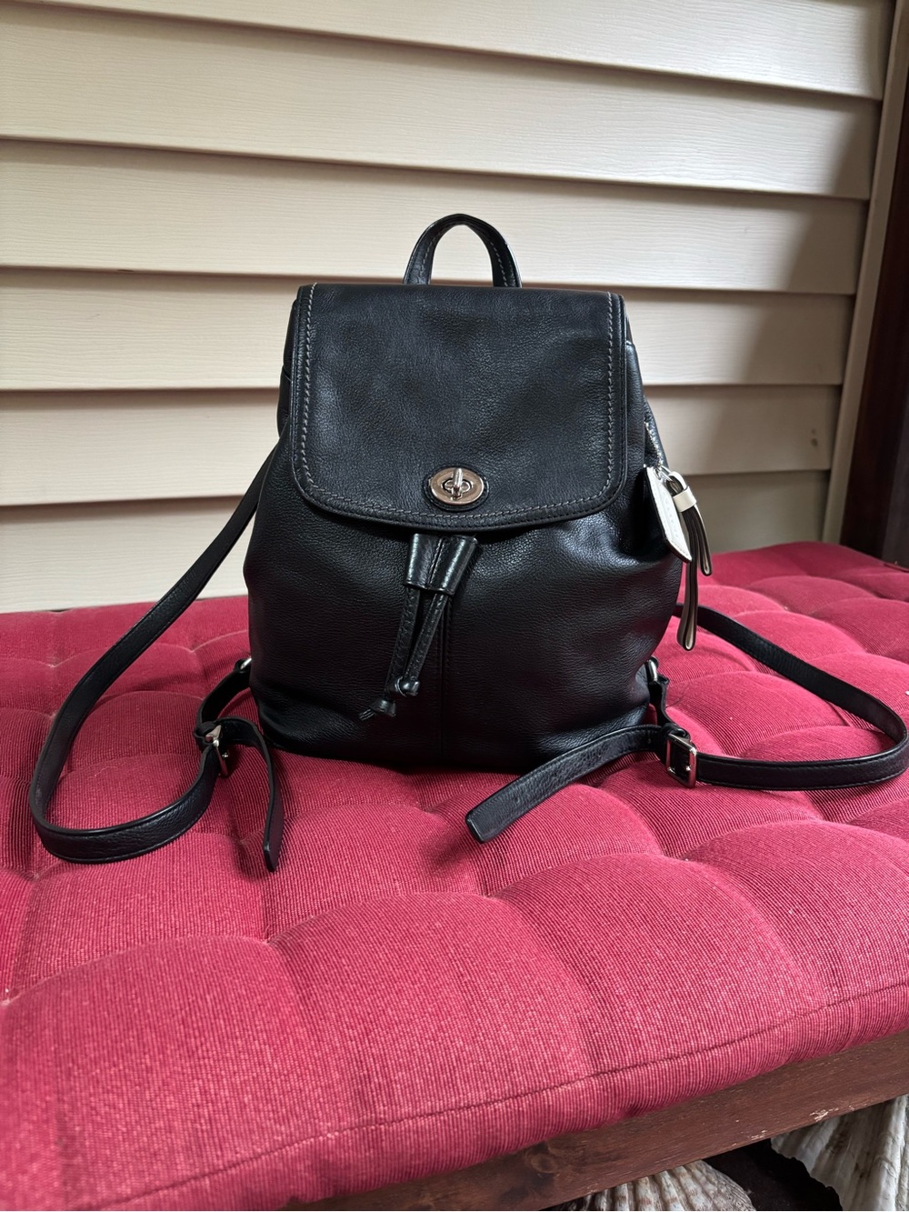 Coach F24385 Black Pebbled Soft Leather Turnlock Drawstring Backpack